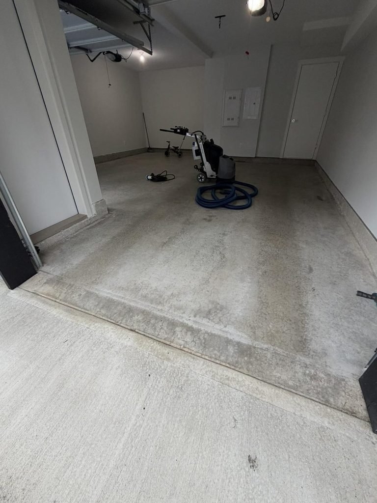 Bare, worn concrete garage floor in Surrey before a Wish Coatings finish